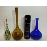 Four Art glass wares, one bearing a label for Studio Glass Sweden, and a blue glass baluster vase