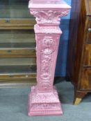 Large 20th century pink glazed jardiniere stand of square form, the body decorated with cherubs