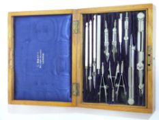 Set of technical drawing instruments in original wooden box, manufactured by C Baker, 244 High