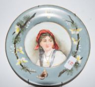 Victorian plate with a hand painted decoration of a young gipsy girl, signed verso