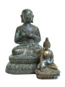 Two metal Buddhas