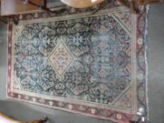 Small Caucasian rug, blue and red ground, triple gulled border, 6ft 5" x 4", (faded/worn)