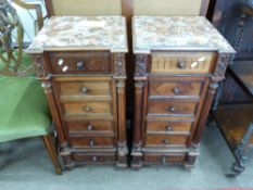 Pair of late 19th century Continental marble top bedside cabinets each fitted with three drawers,