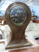 Large late 19th/early 20th century balloon formed mantel clock, the faded mahogany case with a black