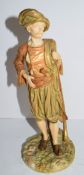 Royal Worcester Hadley figure of a Bringaree Indian on moulded base (repaired)