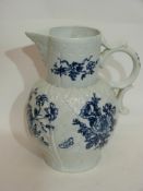 Large 18th century Worcester porcelain mask jug decorated with floral sprays on a moulded cabbage