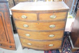 George III mahogany and inlaid bow front chest of two short and three long drawers fitted with
