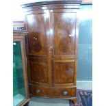 Large mahogany bow front armoire with inlaid decoration, width approx 108cm