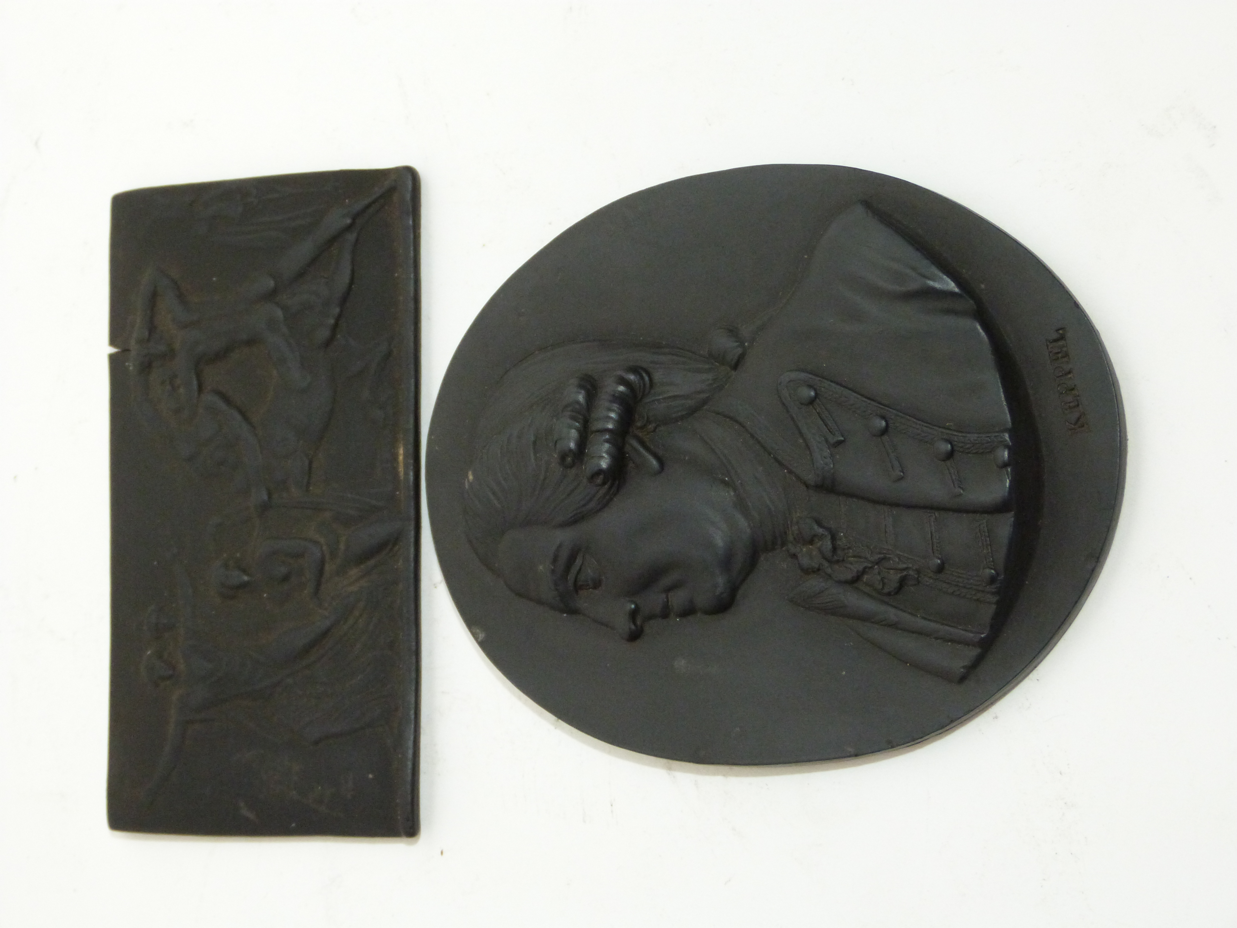 Small Leeds Pottery rectangular plaque with basalt design of wrestlers, together with a Wedgwood