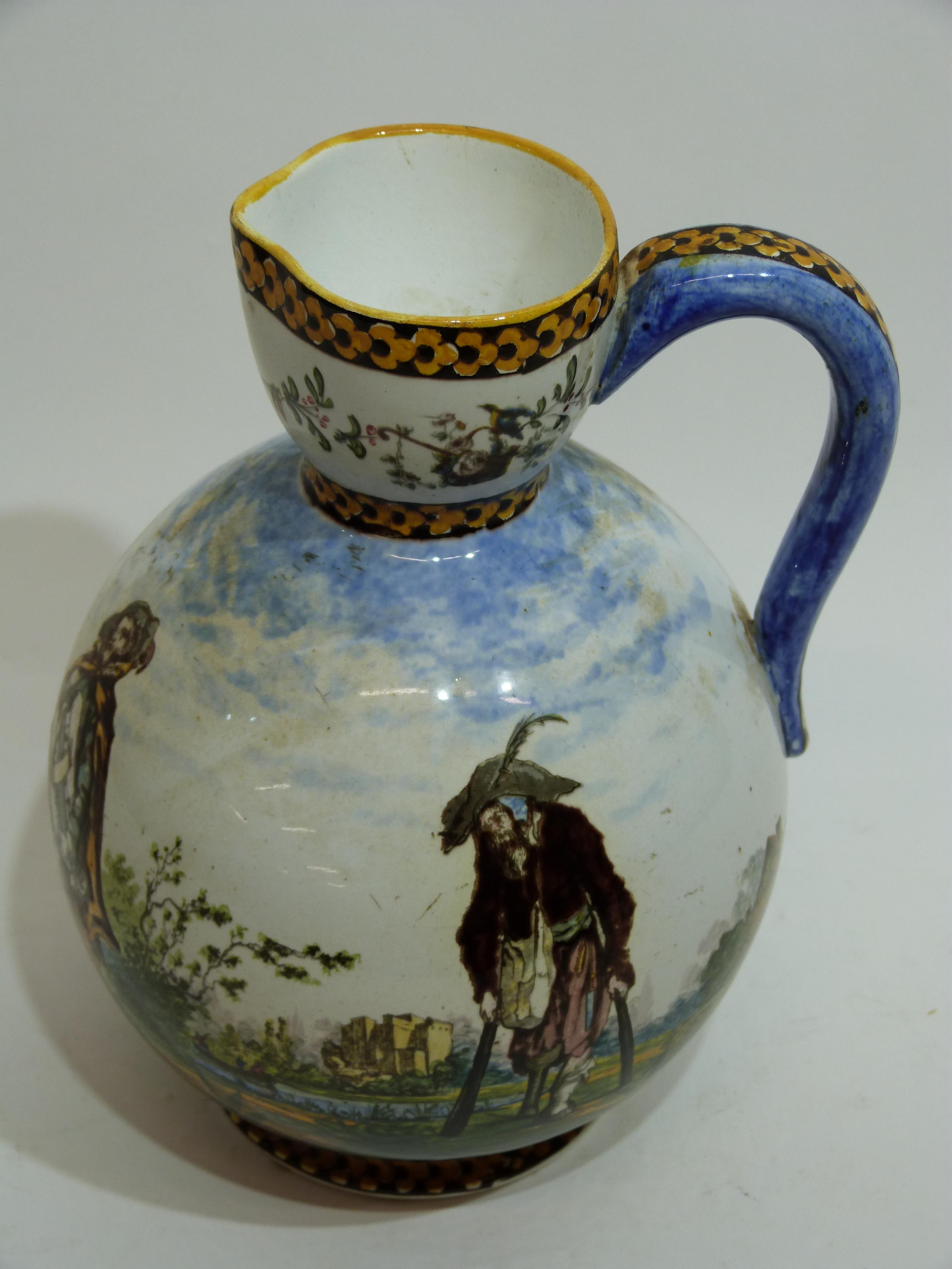 French pottery Gien ware jug decorated with rustic figures in majolica type glazes, 21cm high