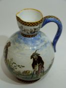 French pottery Gien ware jug decorated with rustic figures in majolica type glazes, 21cm high