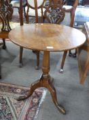 Victorian oak circular top table set on turned column and tripod base, 69cm high