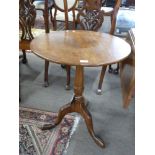 Victorian oak circular top table set on turned column and tripod base, 69cm high