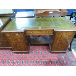 Victorian walnut veneered twin pedestal desk, the top inset with green tooled leather, the base with