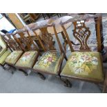 Set of 5 Chippendale style mahogany dining chairs, elaborate pierced splat backs, old tapestry