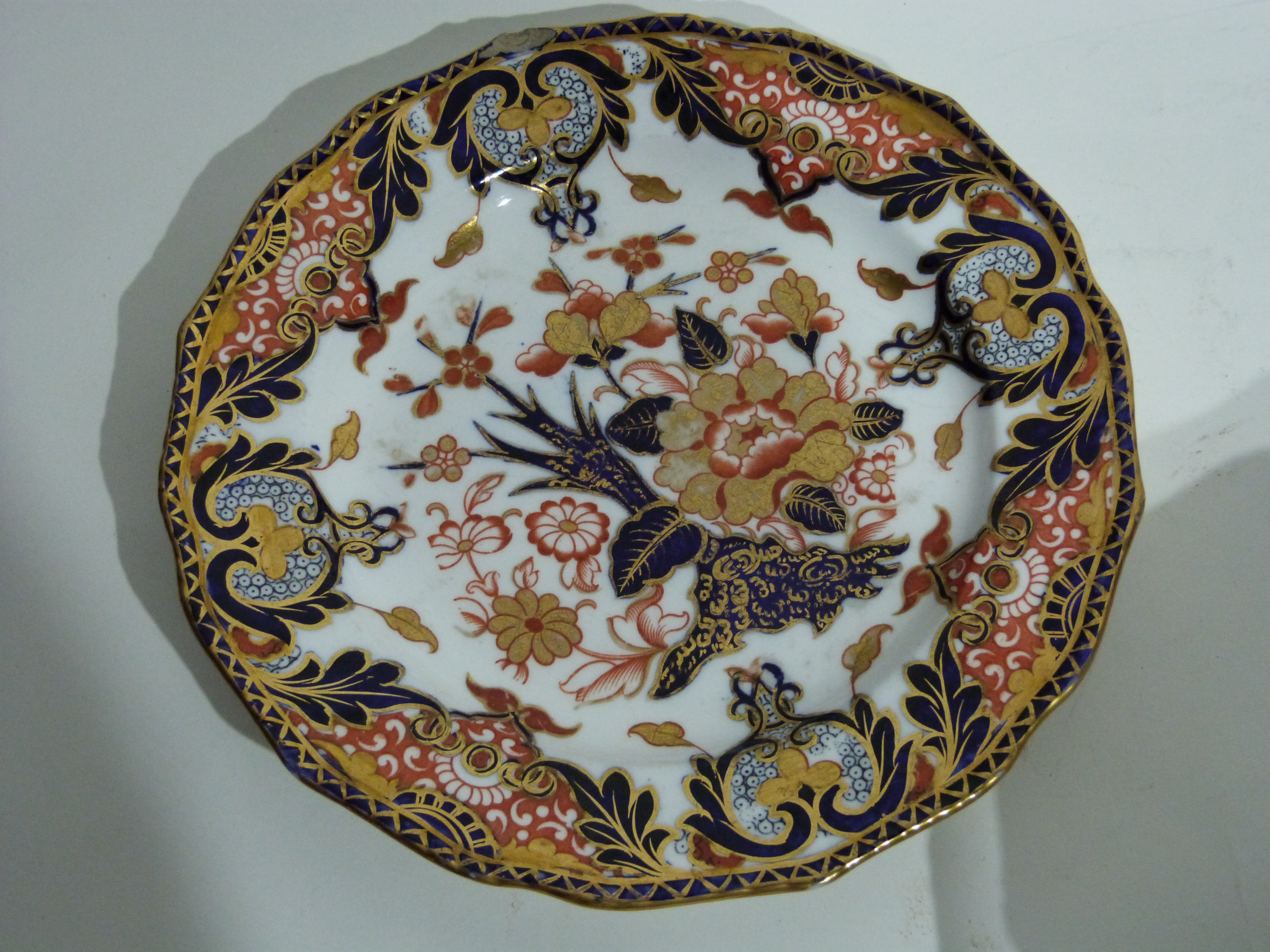 Set of 12 19th century Crown Derby plates all with typical Imari designs in blue, gilt and red, - Image 3 of 4