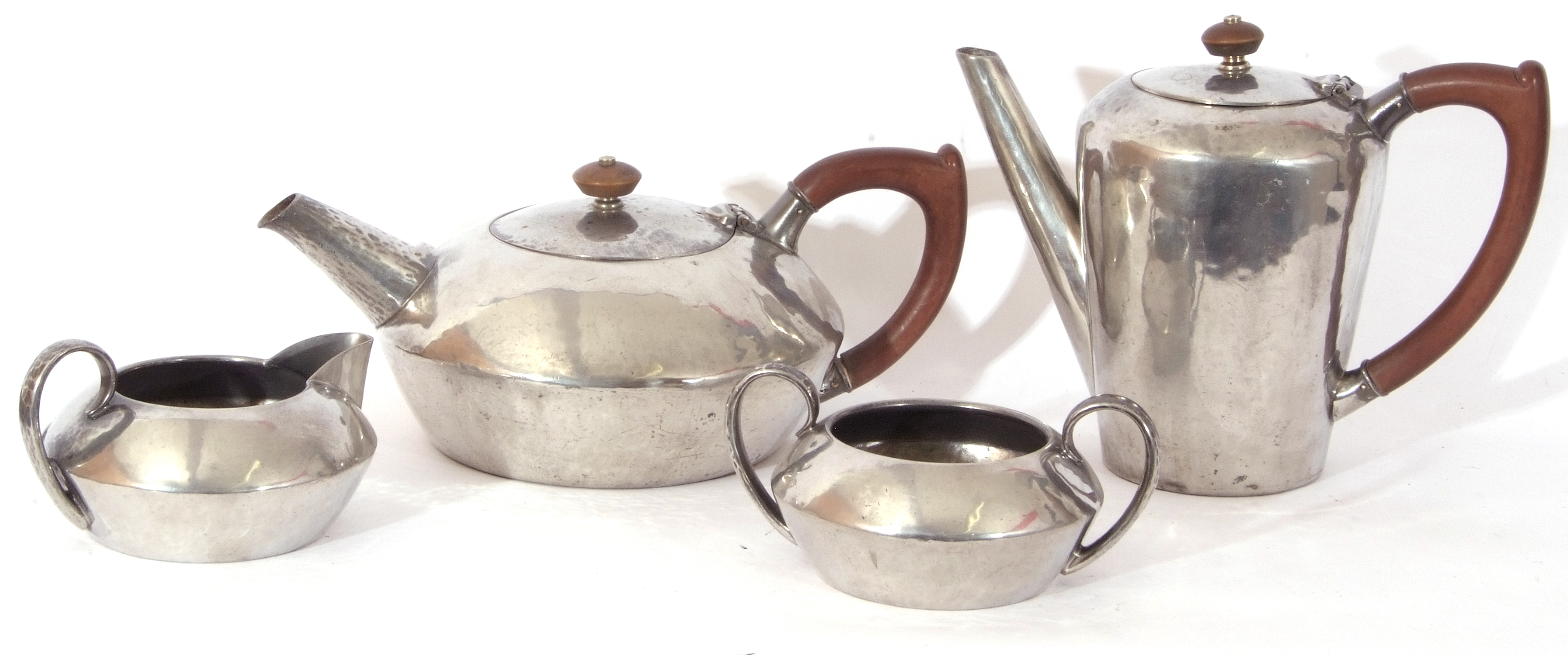 A Tudric Pewter four-piece tea service made for Liberty & Co