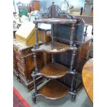 Victorian burr walnut veneered four-tier whatnot with turned supports, raised on short feet with