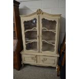 CONTINENTAL PAINTED SIDE CABINET, THE TOP SECTION WITH TWO GLAZED DOORS AND SHELVES INTERIOR OVER