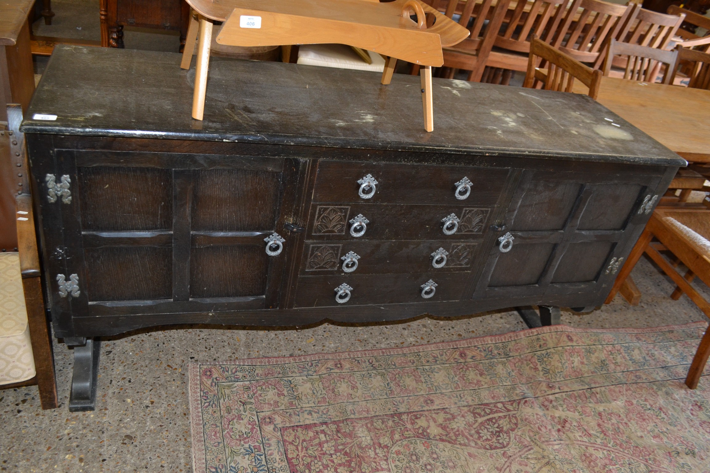 20TH CENTURY DARK STAINED OAK SIDEBOARD WITH TWO DOORS AND FOUR DRAWERS
