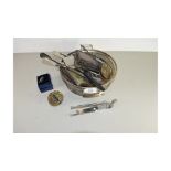 SILVER PLATED TABLE BASKET CONTAINING MODERN DECANTER LABELS, LOBSTER PICK, VINTAGE DESK CLOCK,