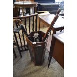 HEXAGONAL HARDWOOD STICK STAND WITH CANE SIDES CONTAINING MIXED WALKING STICKS