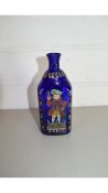 19TH CENTURY BLUE GLASS BOTTLE OVERPAINTED WITH A FIGURE AND FLORAL DETAIL