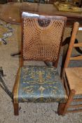 EARLY 20TH CENTURY CANE BACKED SIDE CHAIR WITH FLORAL UPHOLSTERED SEAT, 85CM HIGH