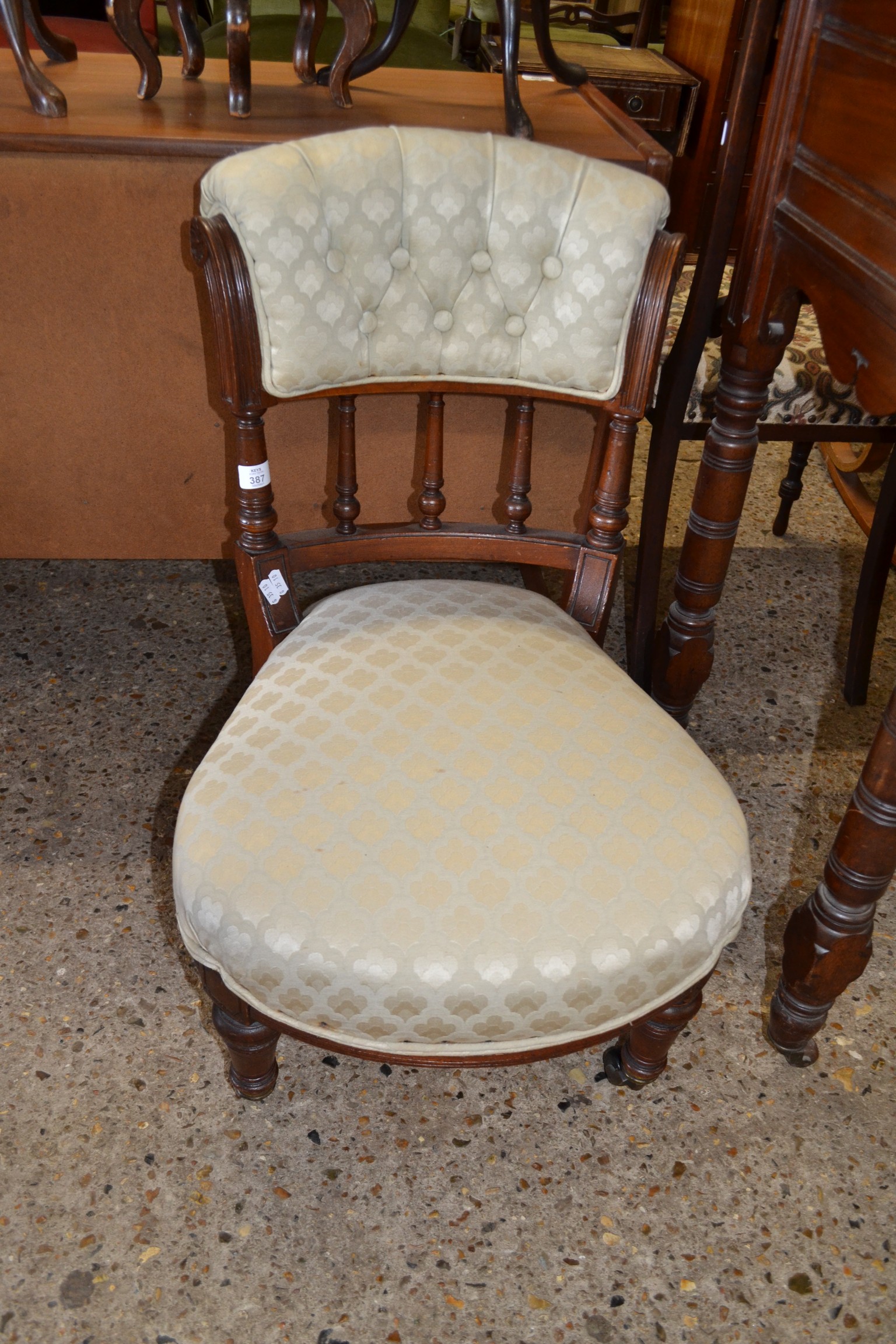 LATE 19TH CENTURY NURSING CHAIR WITH PALE BUTTONED FLORAL UPHOLSTERY, 69CM HIGH