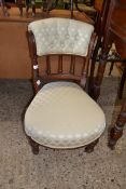 LATE 19TH CENTURY NURSING CHAIR WITH PALE BUTTONED FLORAL UPHOLSTERY, 69CM HIGH