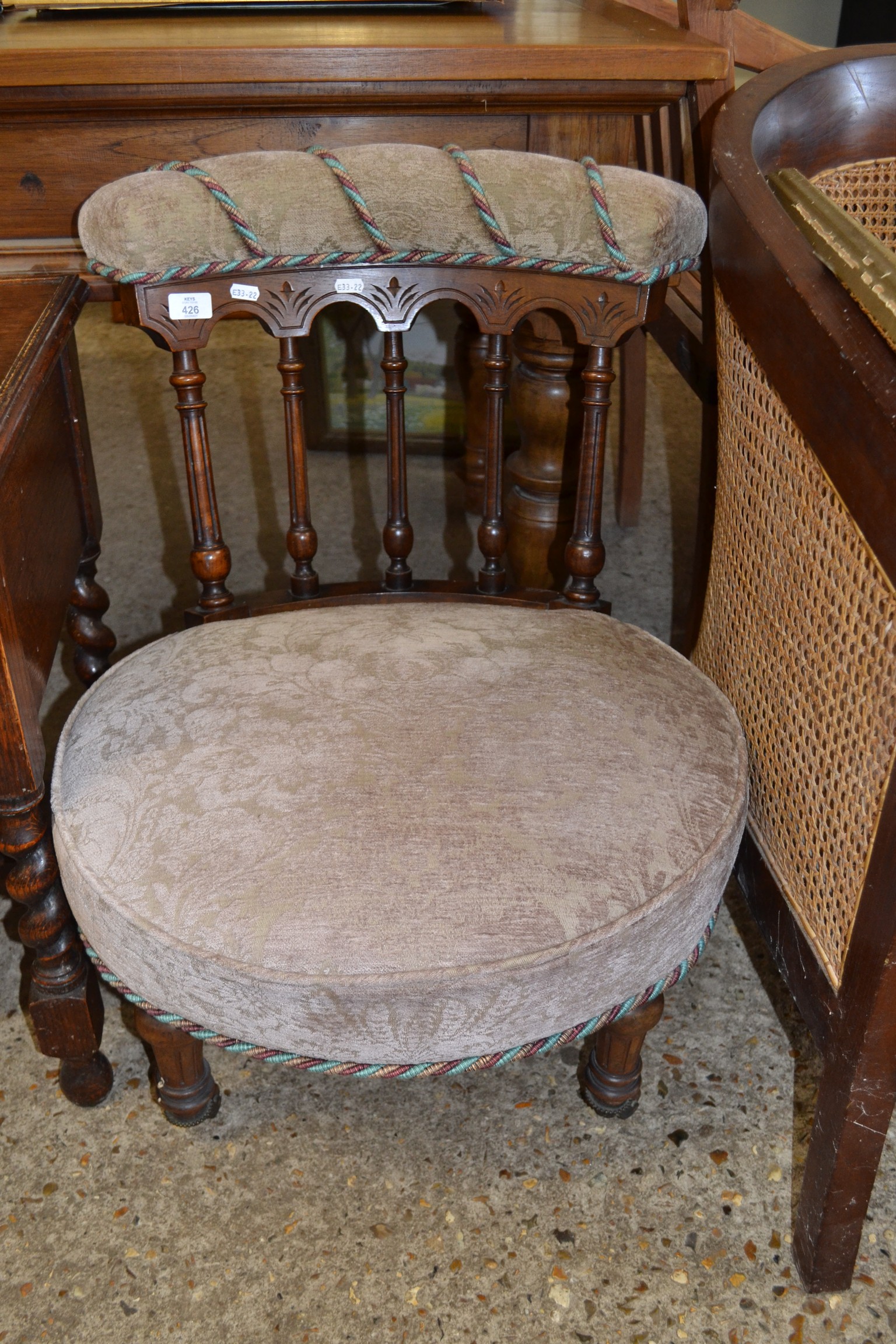 19TH CENTURY CIRCULAR SEATED NURSING CHAIR WITH SPINDLE TURNED BACK, UPHOLSTERED IN FLORAL FABRIC