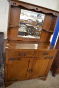 LATE 19TH CENTURY OAK SIDEBOARD IN THE ARTS AND CRAFTS STYLE, WITH MIRRORED BACK AND TWO DRAWERS AND