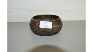 ORIENTAL BRONZED METAL CIRCULAR BOWL WITH FLORAL DECORATION