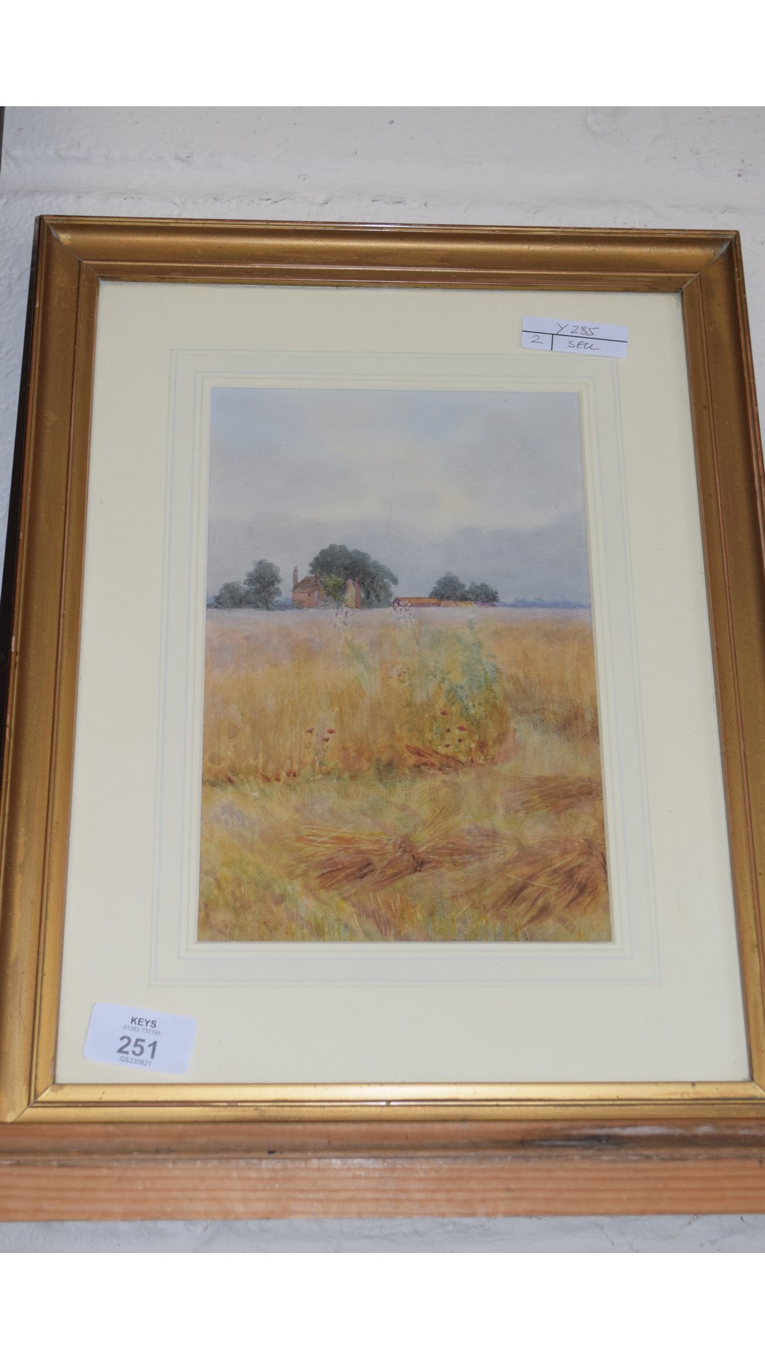 UNSIGNED WATERCOLOUR STUDY - CORNFIELD WITH DISTANT FARM, FRAMED AND GLAZED, 39CM HIGH
