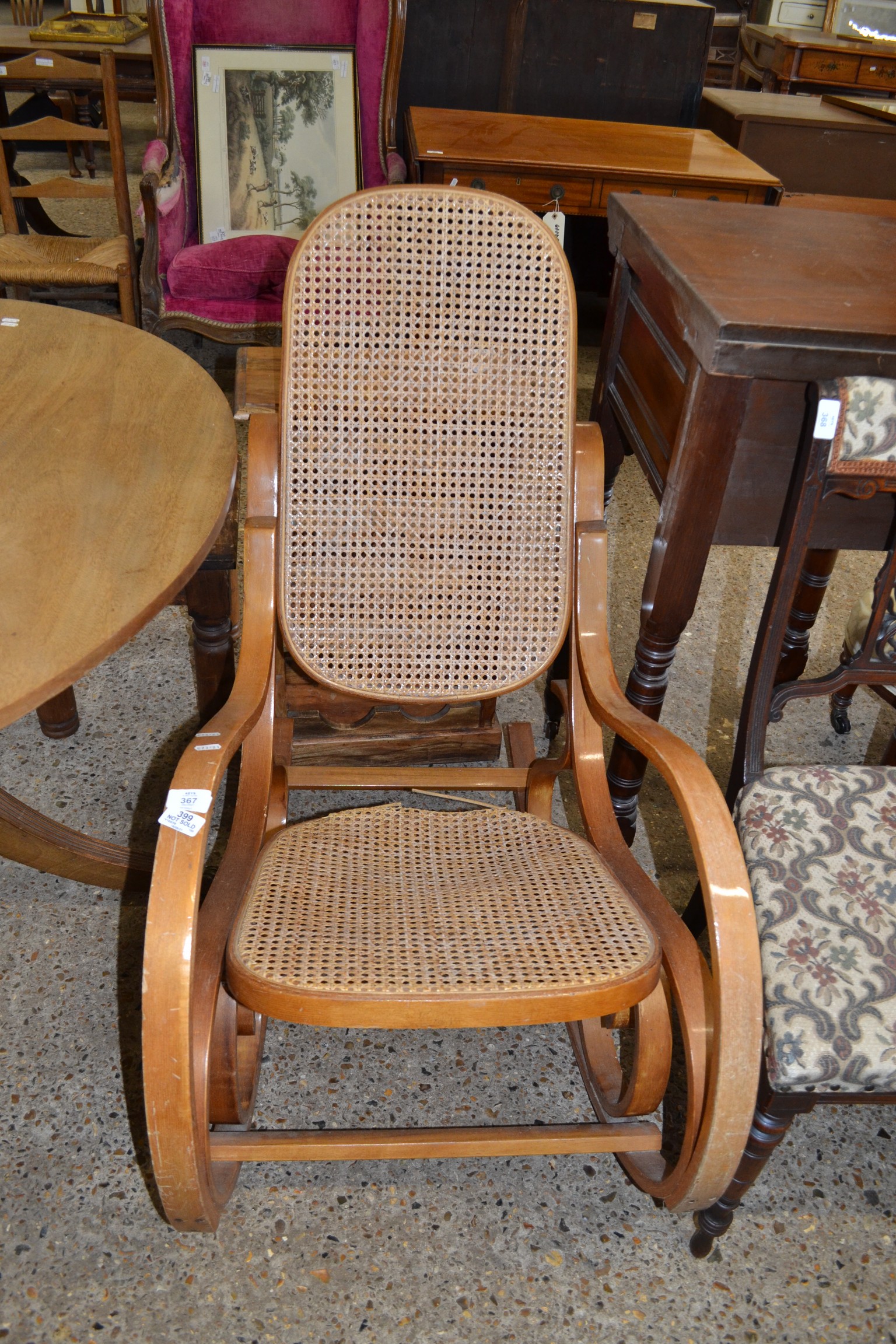 MODERN BENTWOOD CANE SEATED AND BACK ROCKING CHAIR