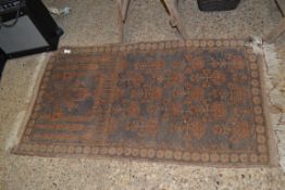 SMALL MIDDLE EASTERN WOOL FLOOR RUG DECORATED WITH FLOWERS AND GEOMETRIC BORDER, 133CM WIDE