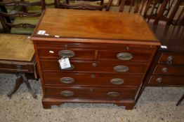 19TH CENTURY MAHOGANY CHEST WITH BRUSHING SLIDE OVER TWO SHORT AND THREE LONG DRAWERS RAISED ON