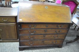 GEORGE III MAHOGANY BUREAU, FALL FRONT WITH AN INTERIOR WITH SMALL DRAWERS AND PIGEONHOLES OVER A