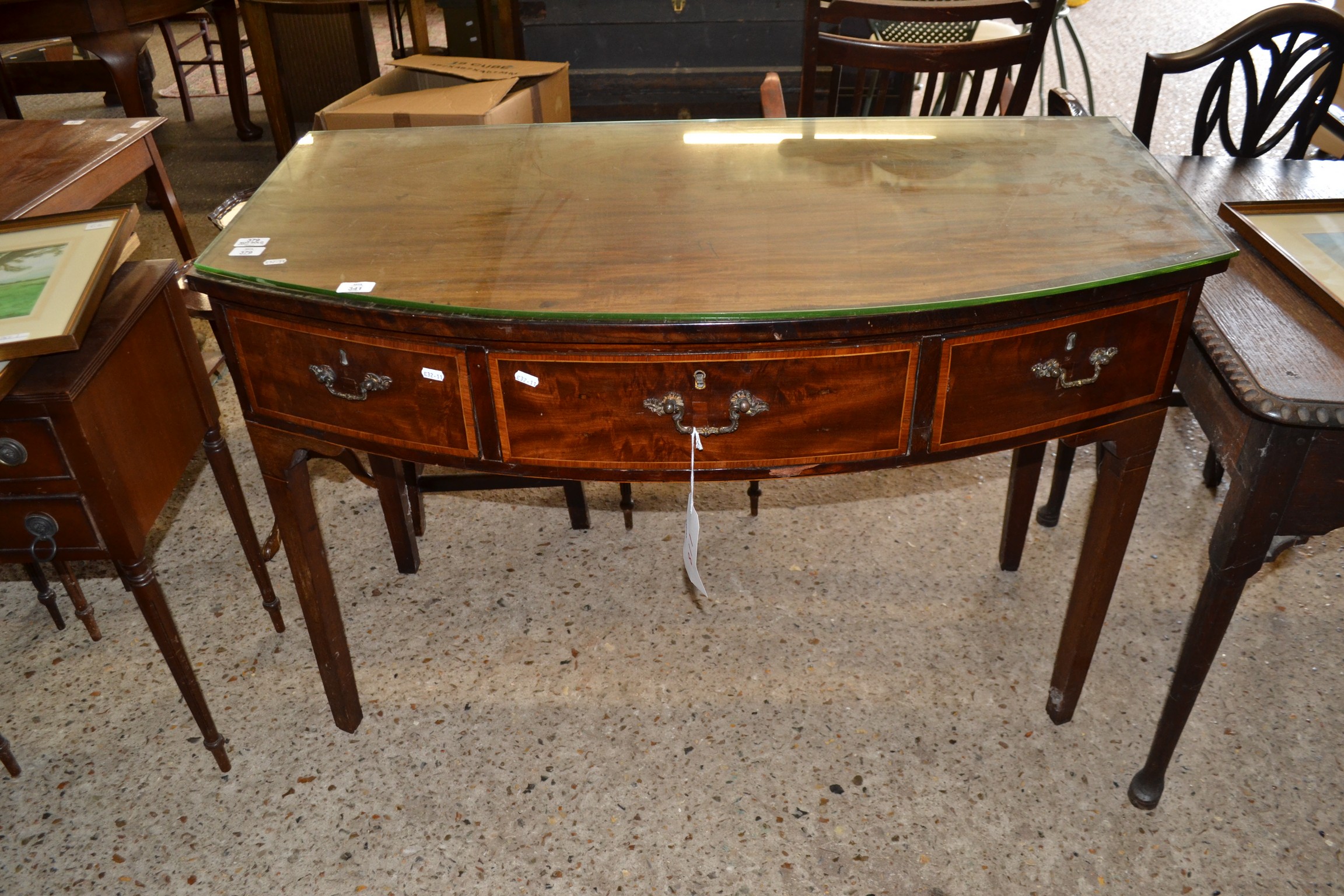 19TH CENTURY MAHOGANY BOW FRONT SIDE TABLE WITH ONE LONG AND TWO SHORT DRAWERS RAISED ON TAPERING
