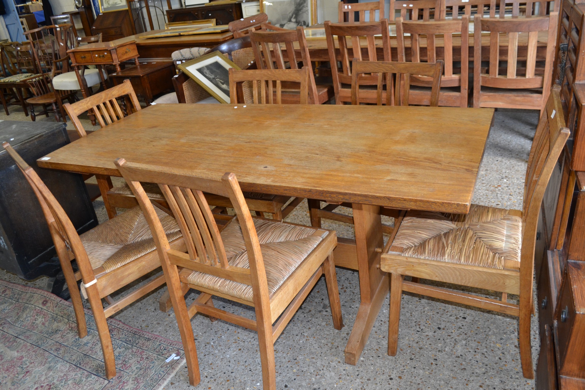 20TH CENTURY OAK REFECTORY STYLE DINING TABLE TOGETHER WITH SIX RUSH SEATED CHAIRS, TABLE 168CM
