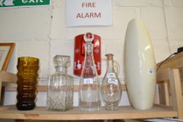 MIXED LOT: THREE DECANTERS, ART GLASS VASE AND A POTTERY VASE (5)