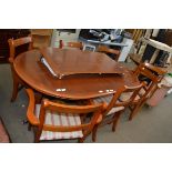 YEW WOOD TWIN PEDESTAL EXTENDING DINING TABLE AND SIX ACCOMPANYING CHAIRS