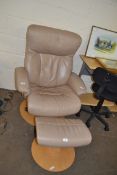 PALE LEATHER REVOLVING RECLINER CHAIR AND FOOTSTOOL