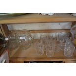 TWO CLEAR GLASS JUGS PLUS VARIOUS CLEAR GLASS TUMBLERS