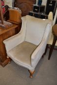 EARLY 20TH CENTURY MUSHROOM UPHOLSTERED WING BACK CHAIR WITH CABRIOLE LEGS, 90CM HIGH