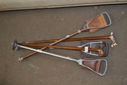 THREE SHOOTING STICKS AND TWO WALKING STICKS