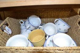 SEAGRASS BASKET CONTAINING FLORAL TEA WARES