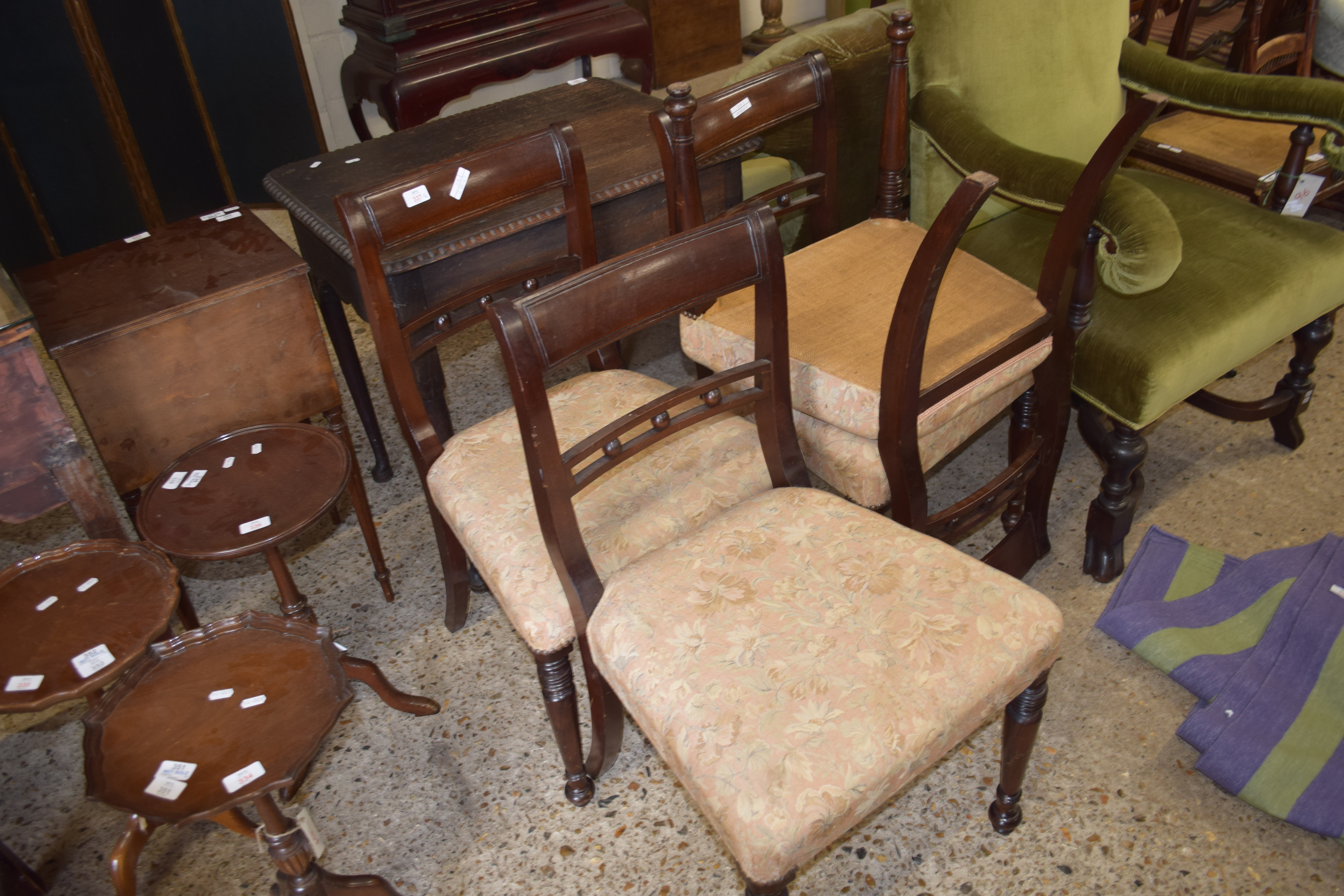 SET OF FOUR VICTORIAN MAHOGANY FRAMED DINING CHAIRS WITH TURNED FRONT LEGS AND FLORAL UPHOLSTERED