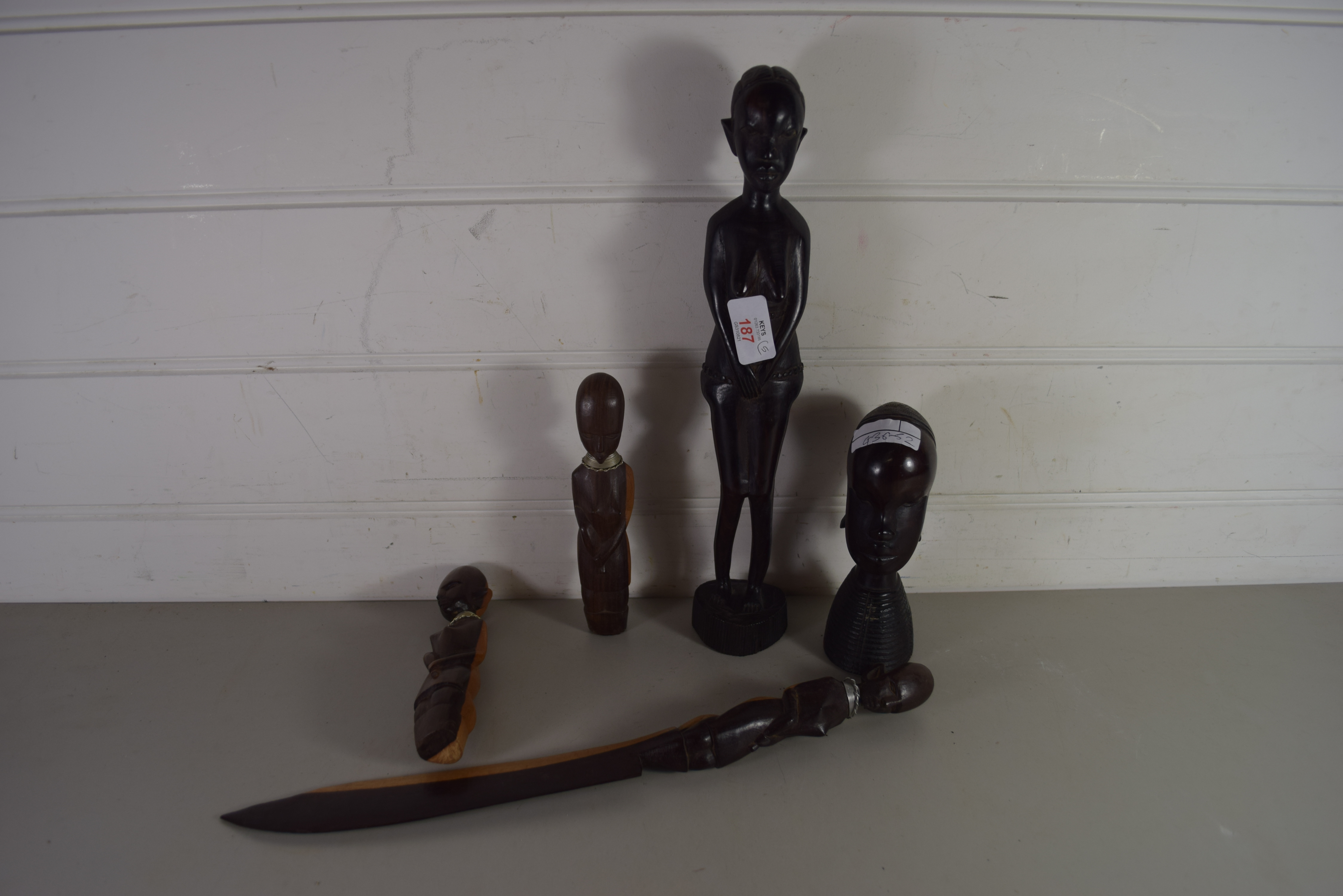 MIXED LOT OF KENYAN HARDWOOD MODELS AND A SIMILAR PAPER KNIFE