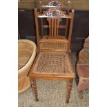 PAIR OF LATE 19TH CENTURY AMERICAN WALNUT CANE SEATED SIDE CHAIRS WITH TURNED LEGS